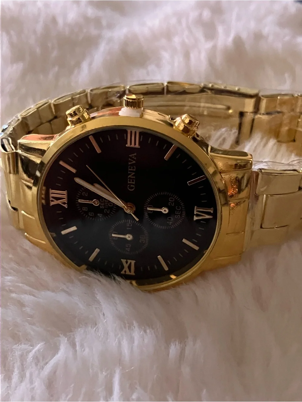 Geneva Gold Tone Watch with Black Dial